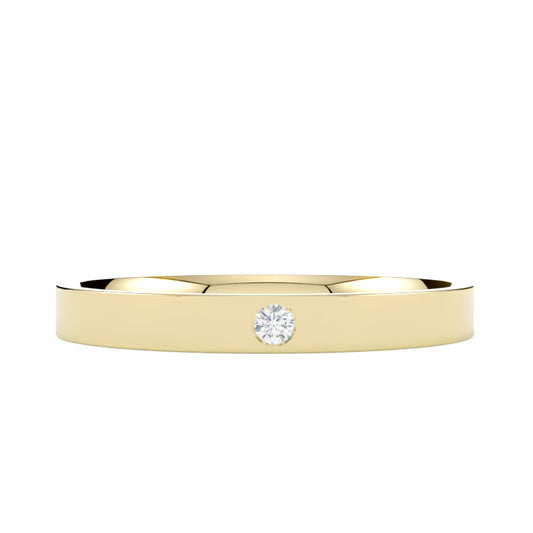 Płaska subtelna obrączka ślubna z diamentem 0,02 ct z żółtego złota 585 od GOLDPORT