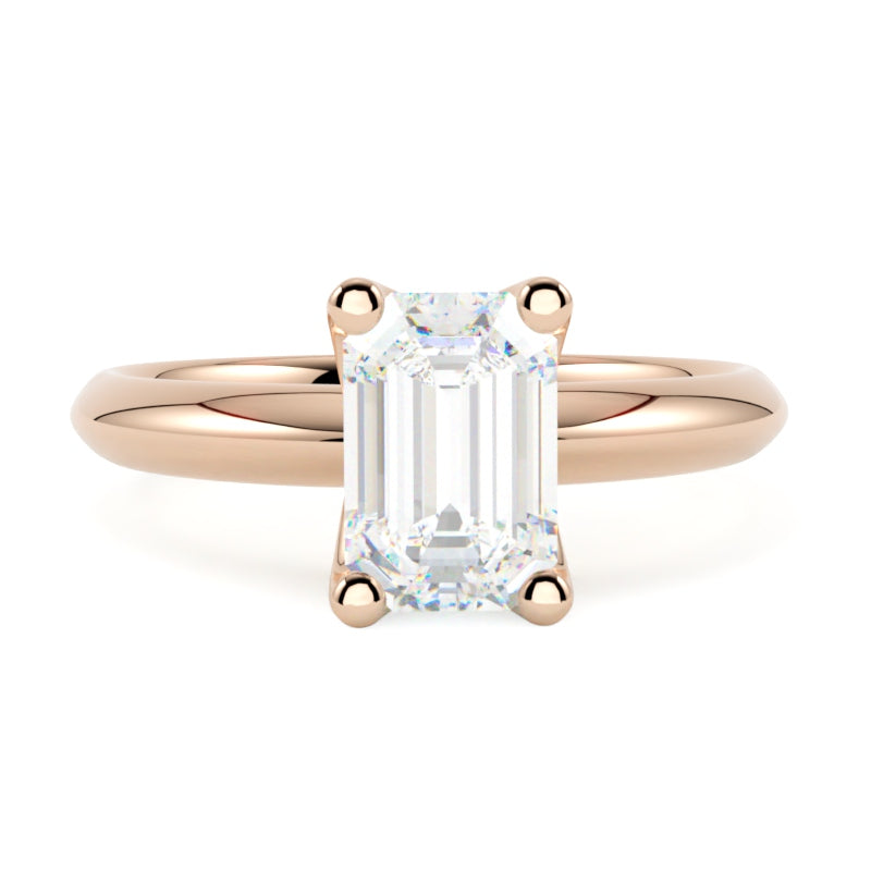 Pierścionek z diamentem emerald cut w różowym złocie