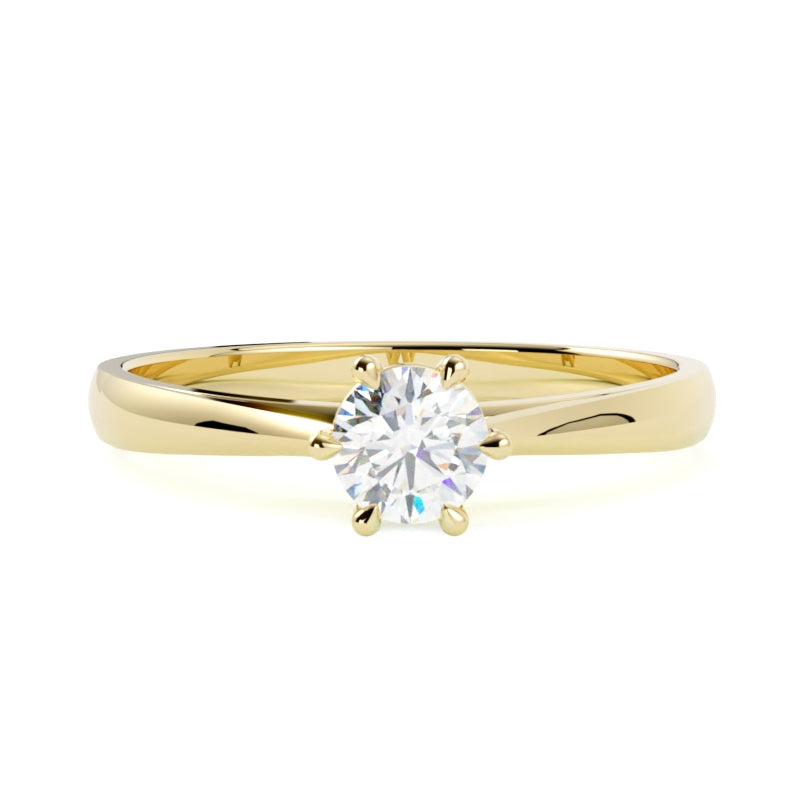 Złoty pierścionek zaręczynowy 585 z diamentem – klasyka w nowoczesnym wydaniu