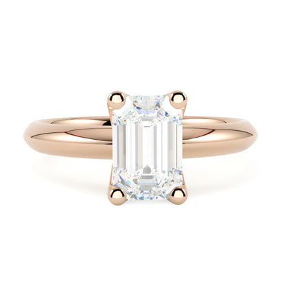 Pierścionek z diamentem emerald cut w różowym złocie